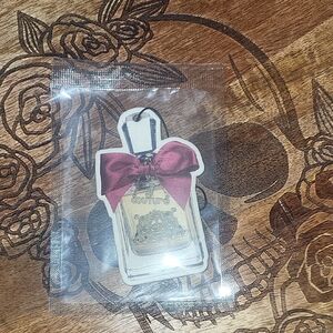 Unlisted Gold and Red Perfume Bottle Decor